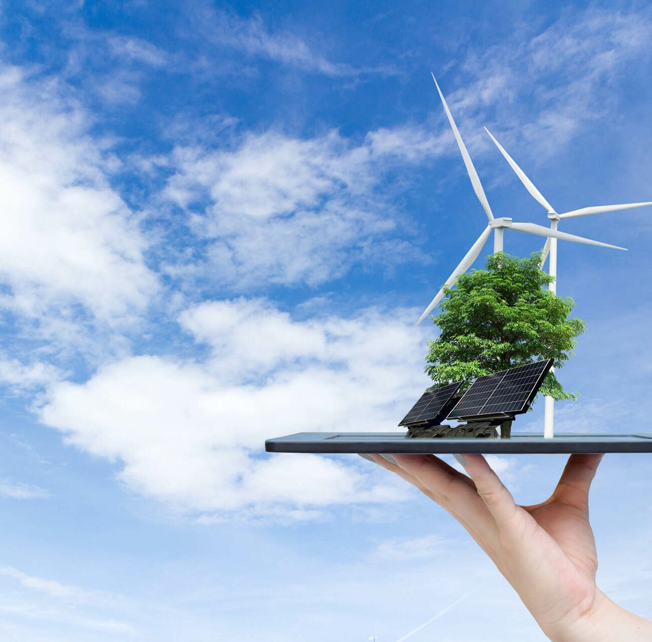 ecological-system-solar-energy-city-hand-holding-tablet-1300x1280 STG Energy